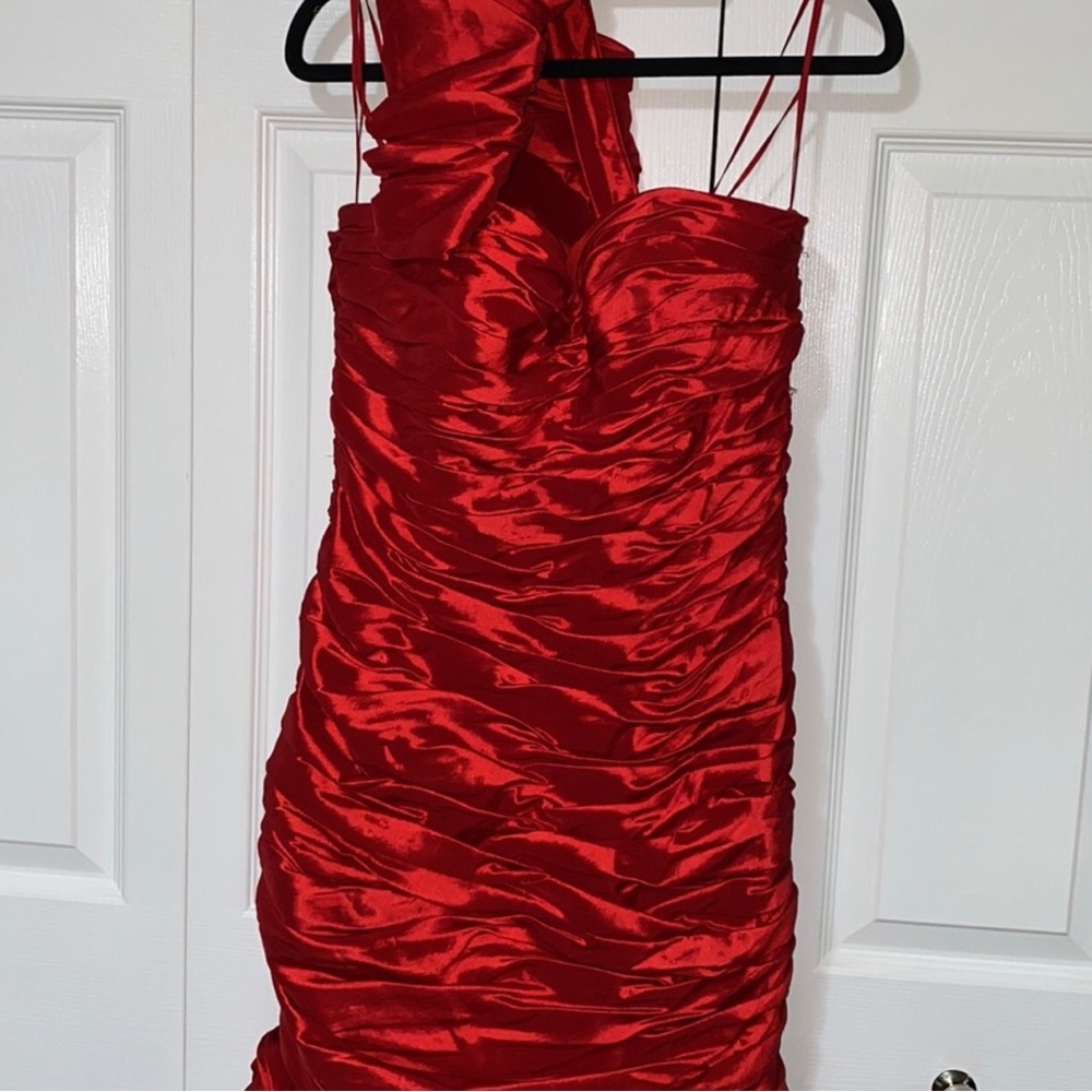 Jovani dress. I wore for my sisters wedding. It is in amazing condition.
